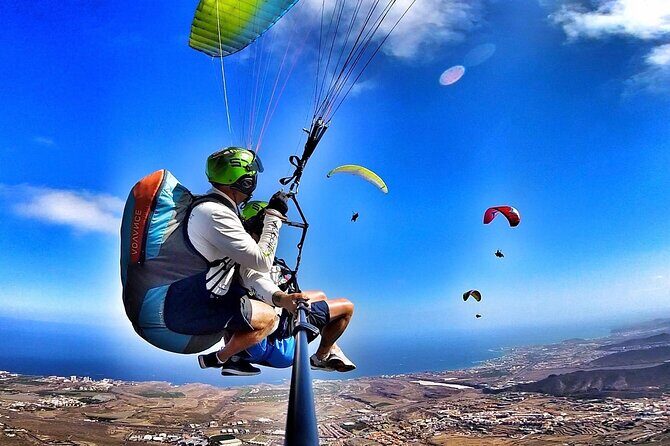GOLD paragliding flight including videos/photos, t-shirt and a bottle of Cava - From your hotel to takeoff: Mercedes Vito pickup and the drive up