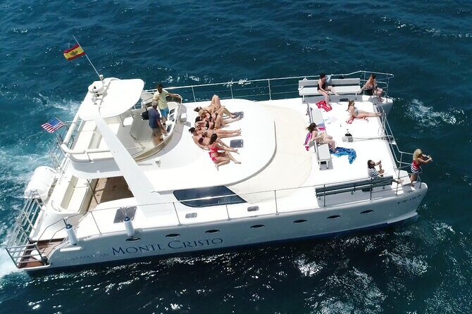 Private Catamaran Charter with Transfer, Buffet and Snorkeling - Lunch, snacks, and included drinks on the sundeck