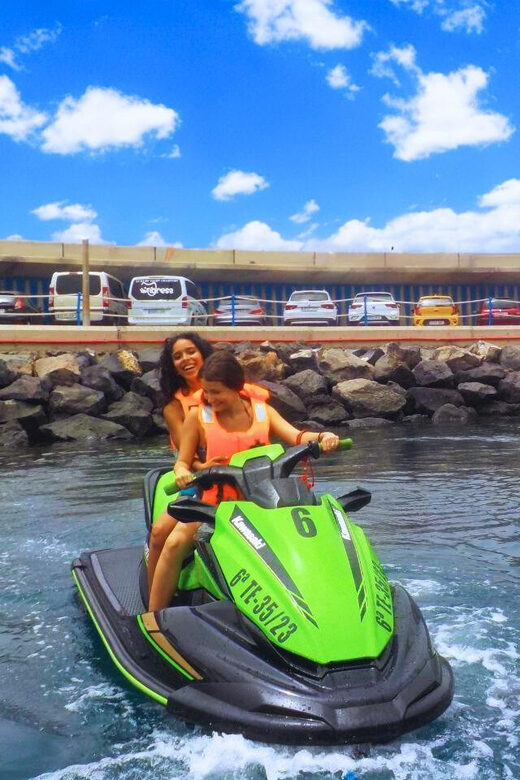 Puerto Colón: Kawasaki Jet Ski Tour Along Tenerife's Coast - The secret photo stop and 5-minute swim
