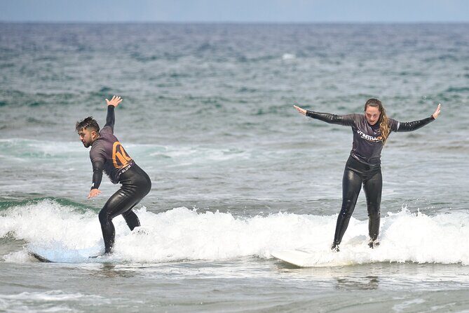 small group surf lesson in Playa de las Américas,Tenerife - Entering Playa de las Américas With the Kontraola Surf School Team
