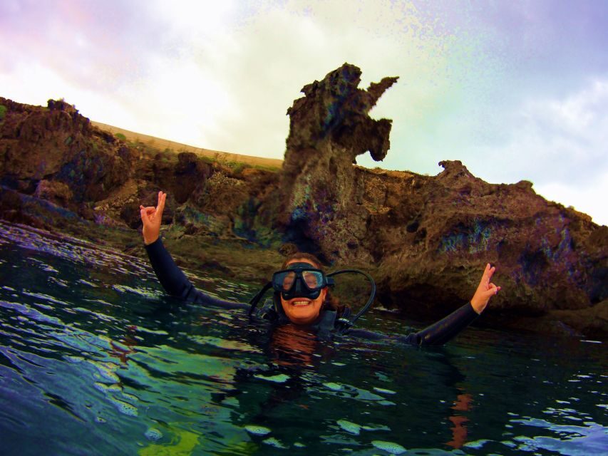 Snorkeling in a Volcanic Bay - One hour snorkeling the volcanic rock formations